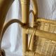 Vintage wicker and bamboo magazine rack