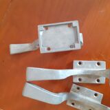 Set of three cast aluminum patères