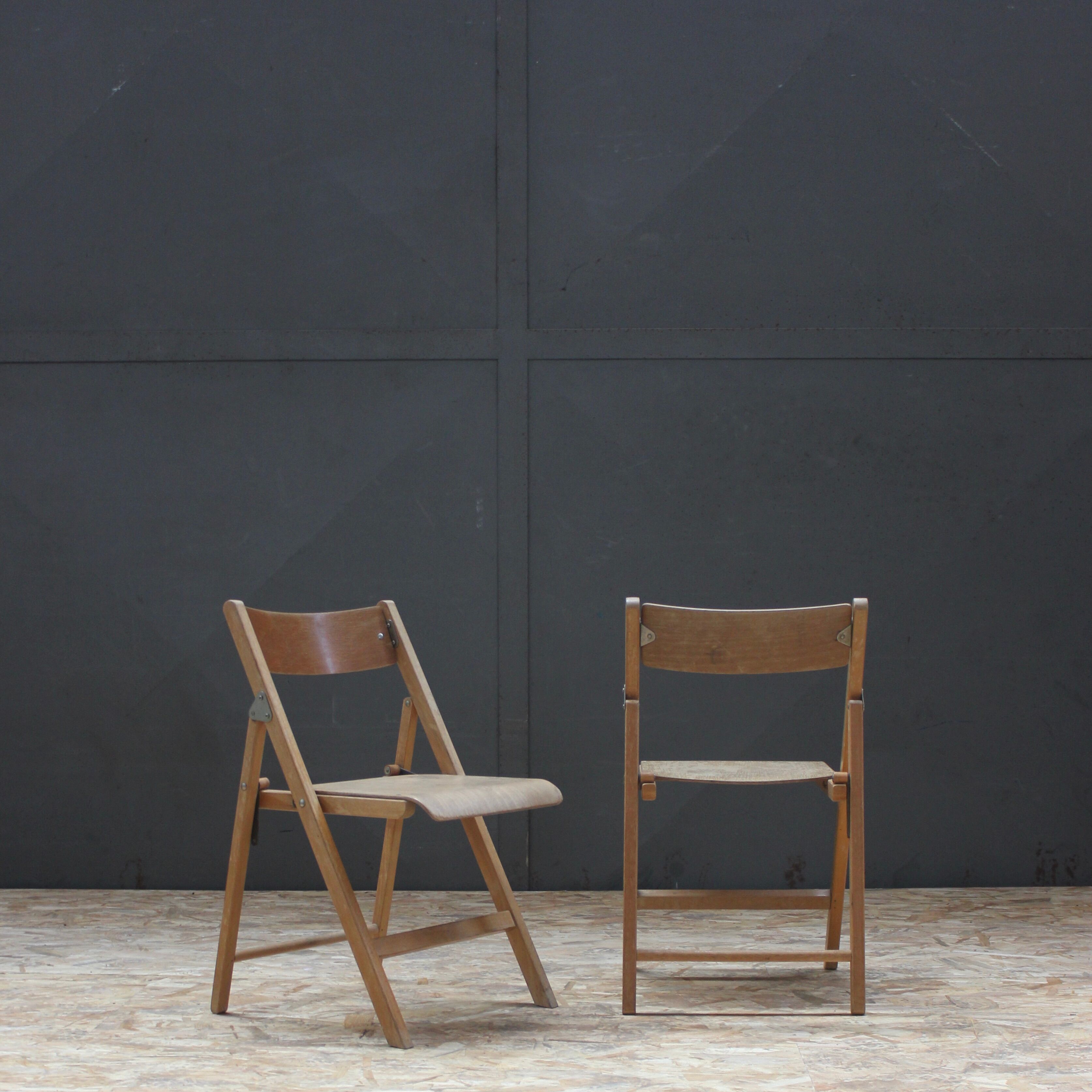 Pair of wooden folding chairs