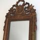 Louis XVI style mirror in patinated and gilded wood