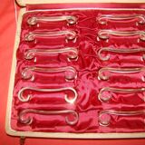 set of 12 silver-plated knife rests from the early 20th century with case