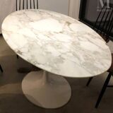Oval dining table, calacatta oro marble top