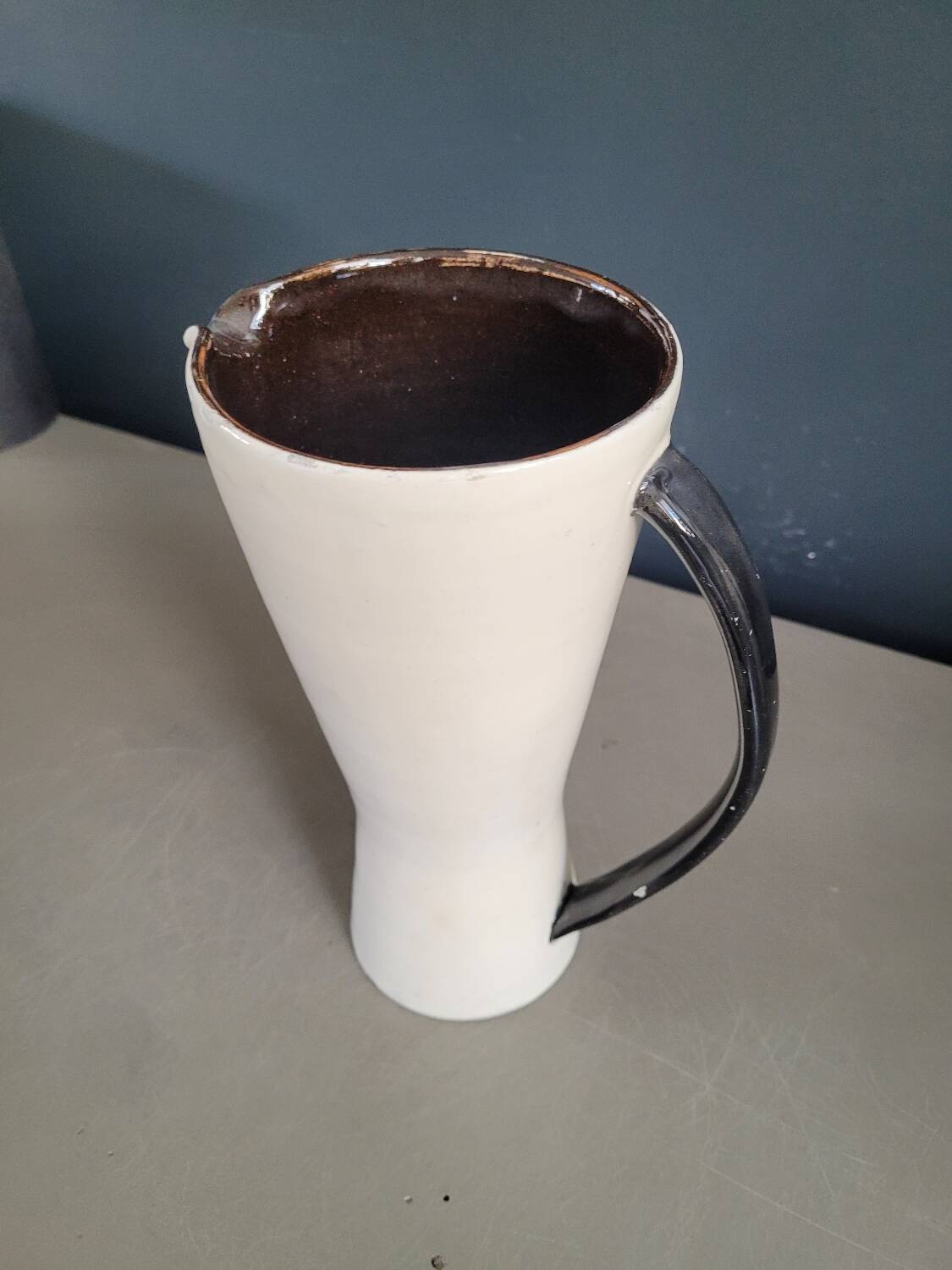Vintage black and white diabolo pitcher