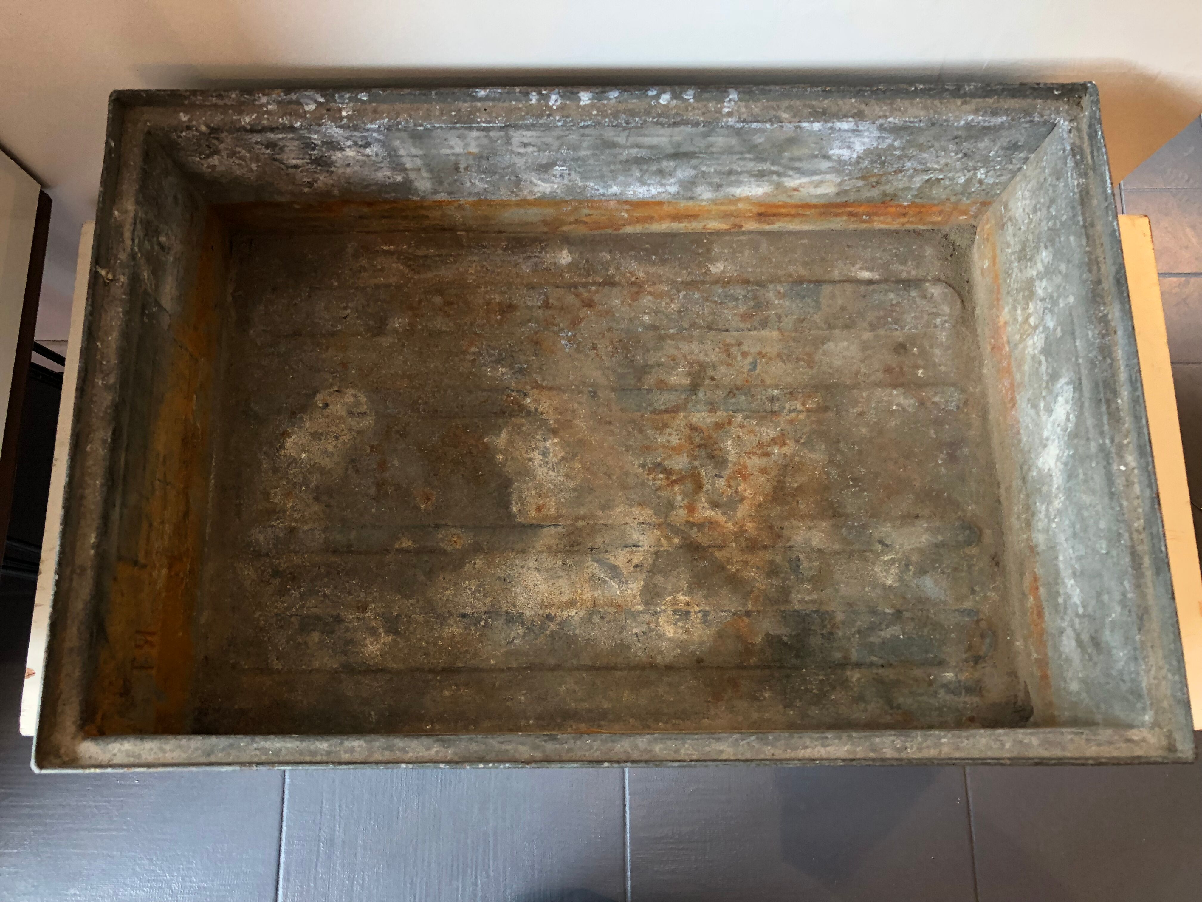 Old galvanized metal locker basket