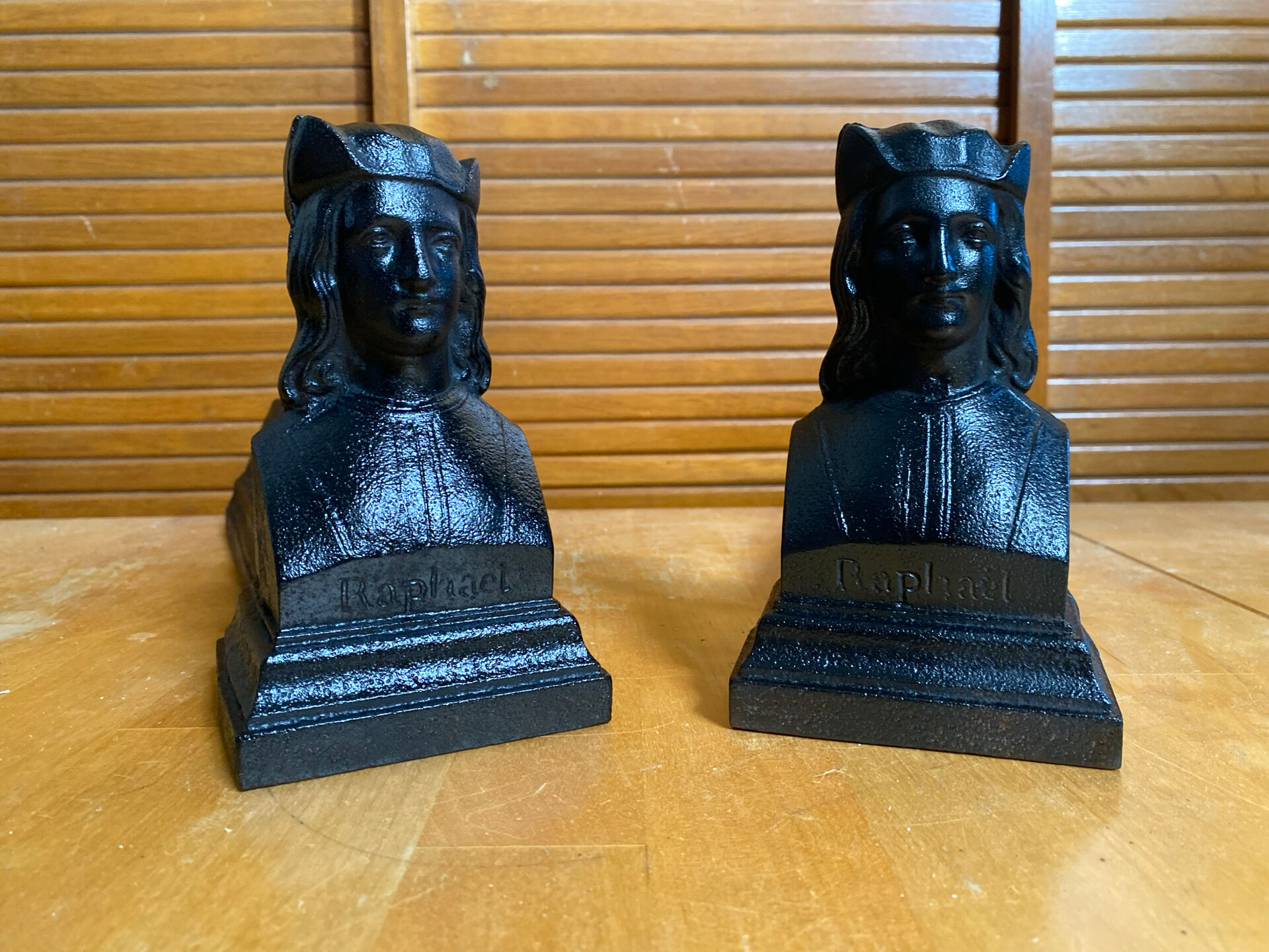 Pair of fireplace chenets raphaël man's head black cast iron vintage #e236