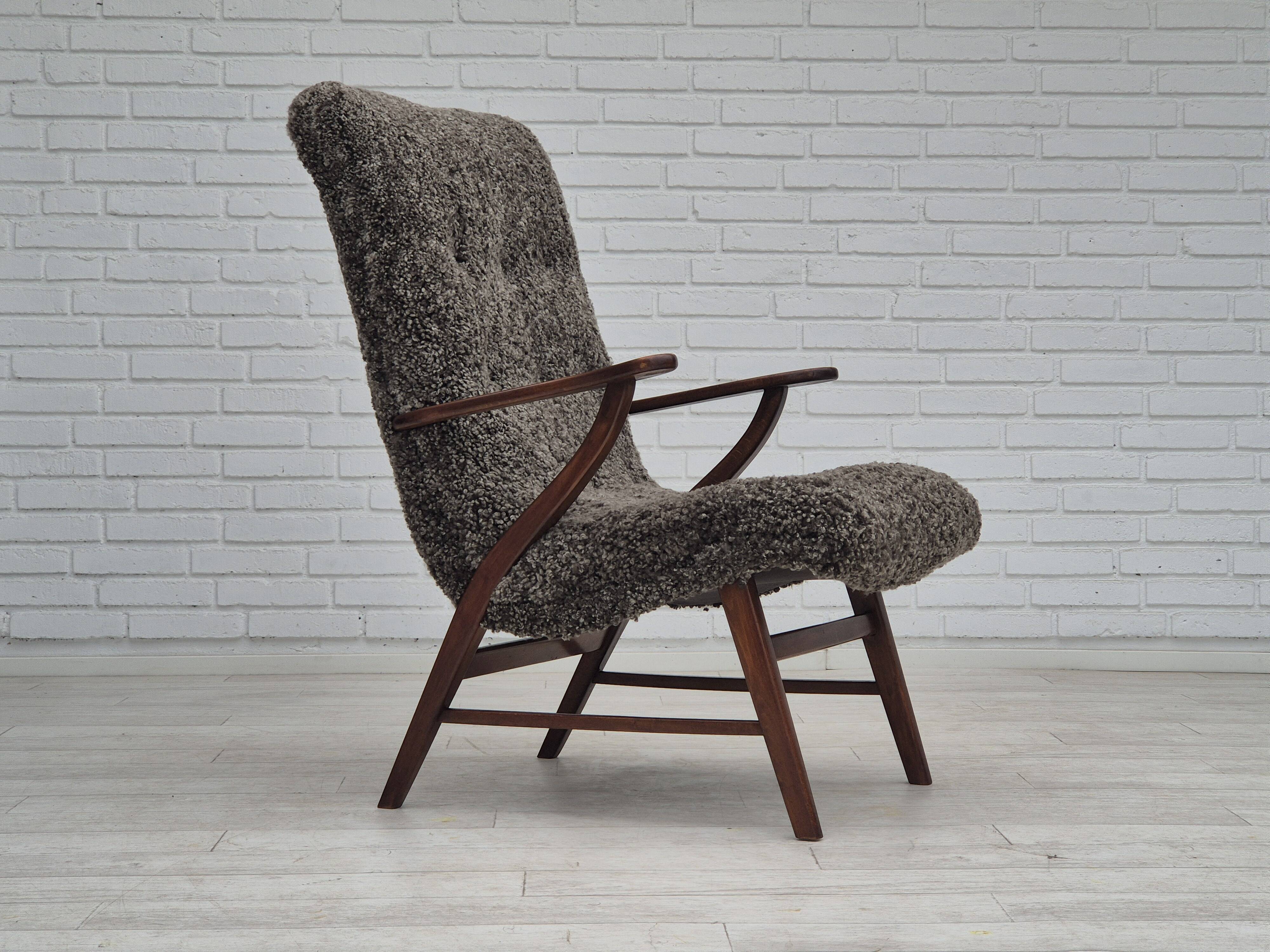 60s, Danish design, refurbished armchair, genuine sheepskin "Wellington".