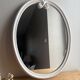 Vintage oval mirror in white enamelled cast iron