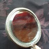 Old hand mirror beveled glass