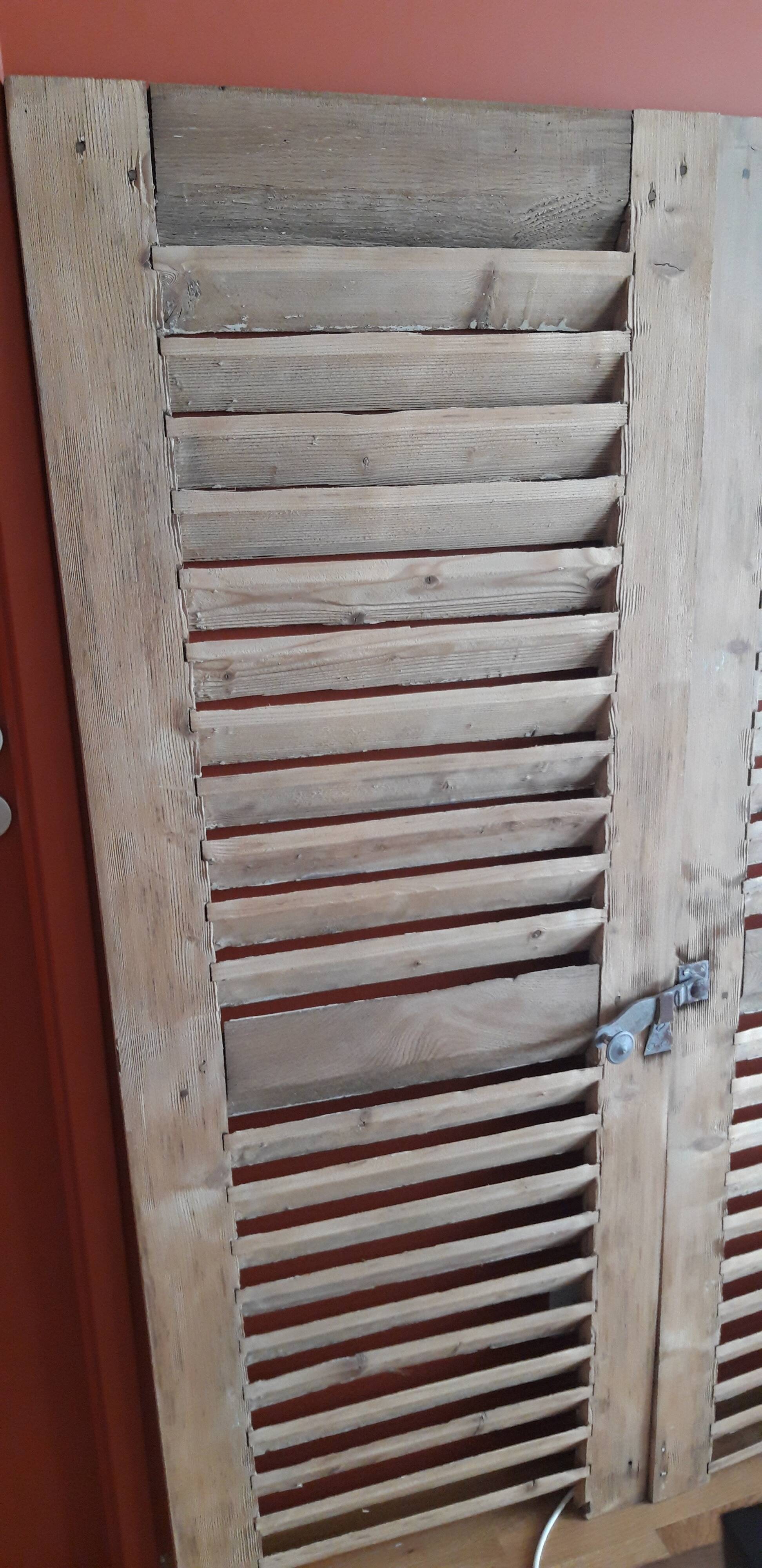 Pair of old unwrapped shutters