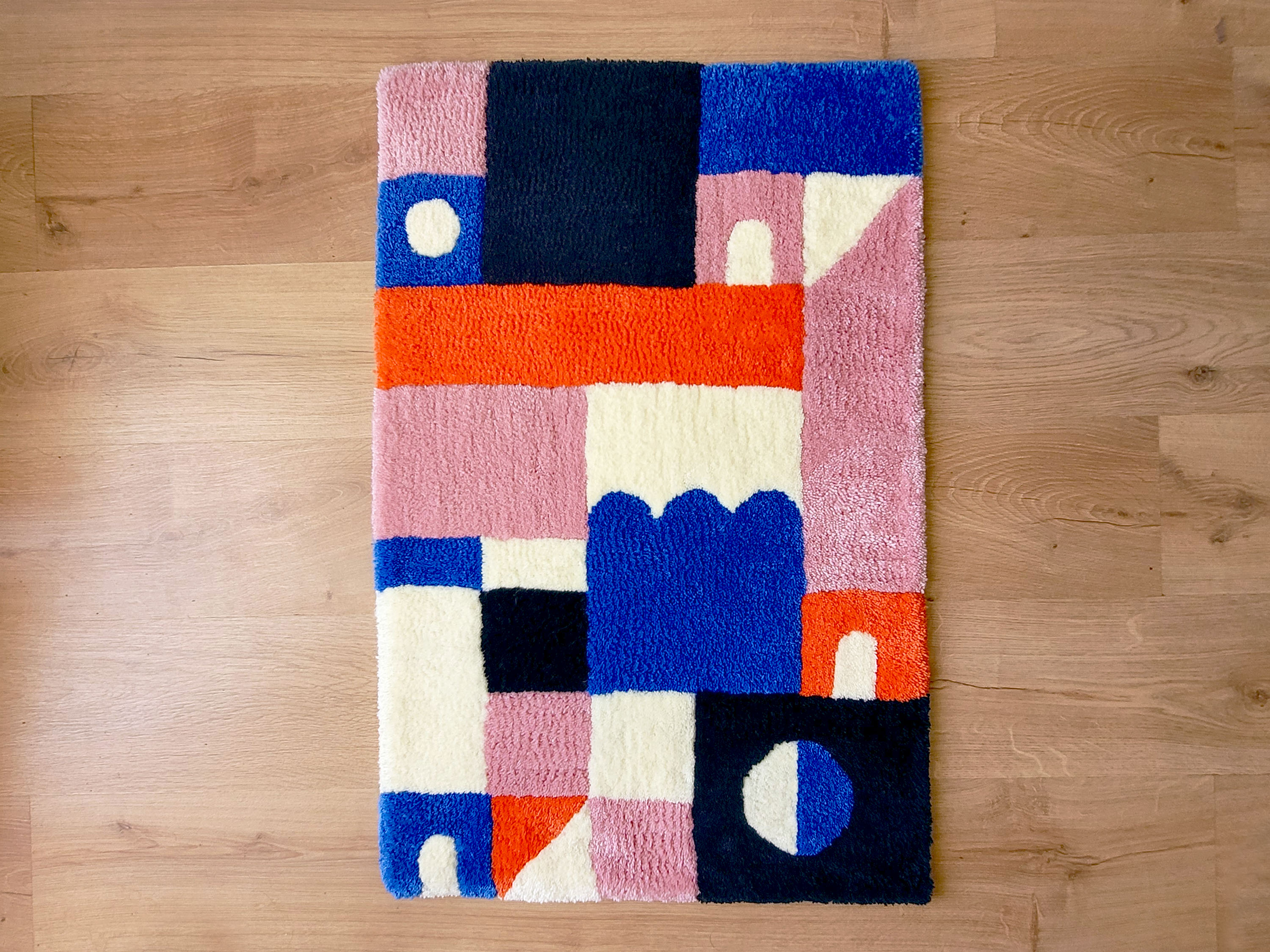 Tapis tufté rectangulaire géométrique 90x60cm