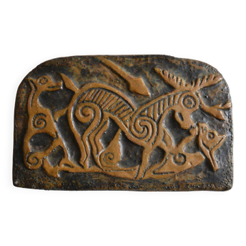 Bas-relief sculpture in terracotta inspired by the Celtic bestiary