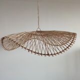 Rattan suspension or lighting fixture in the shape of an undulating circular tray with lattices