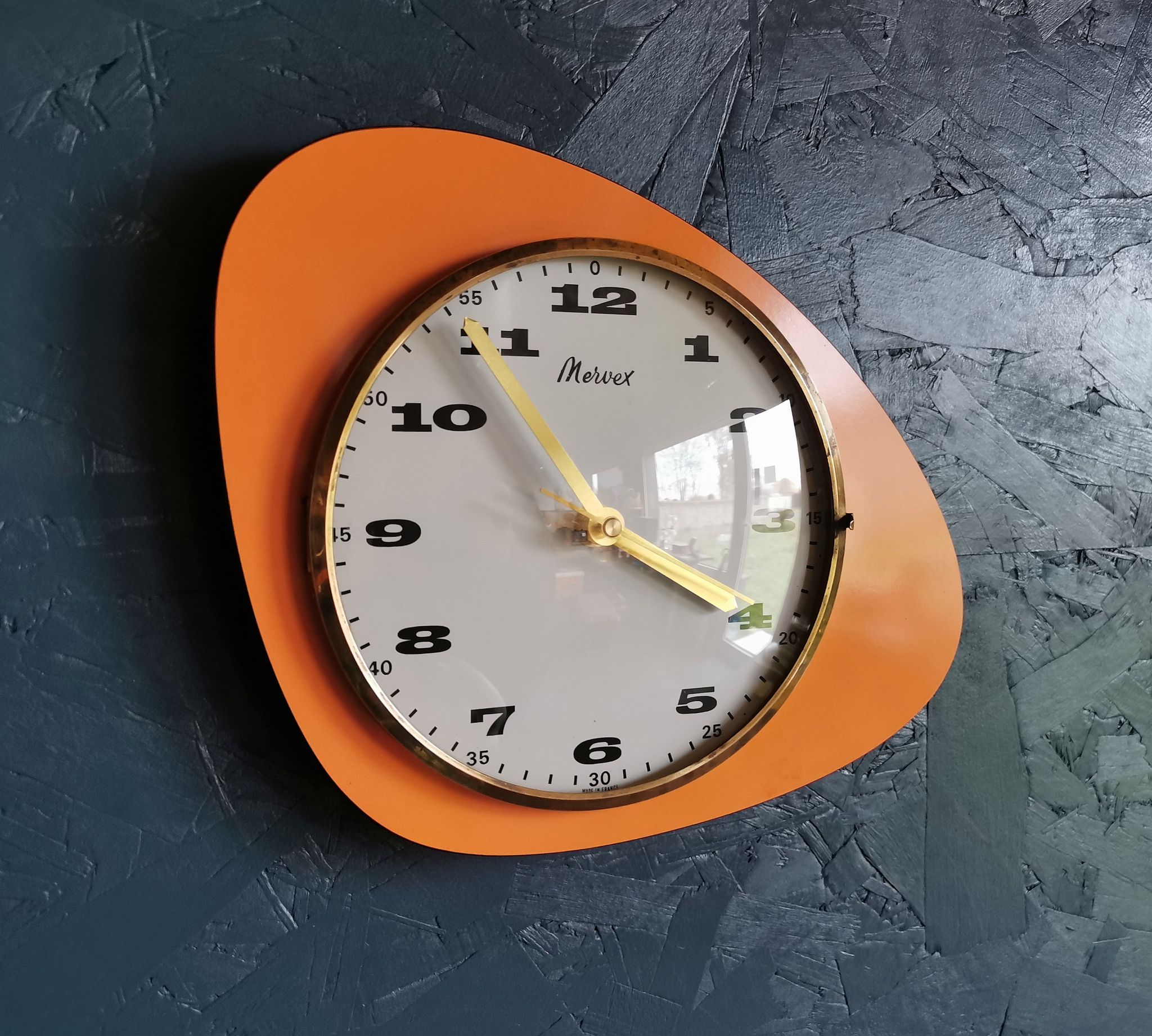 Vintage formica clock asymmetrical silent wall clock "Mervex orange"