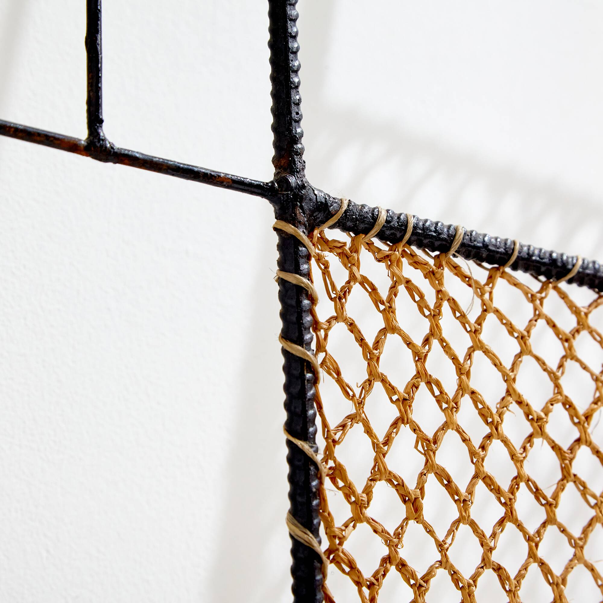 Rattan and metal coat rack