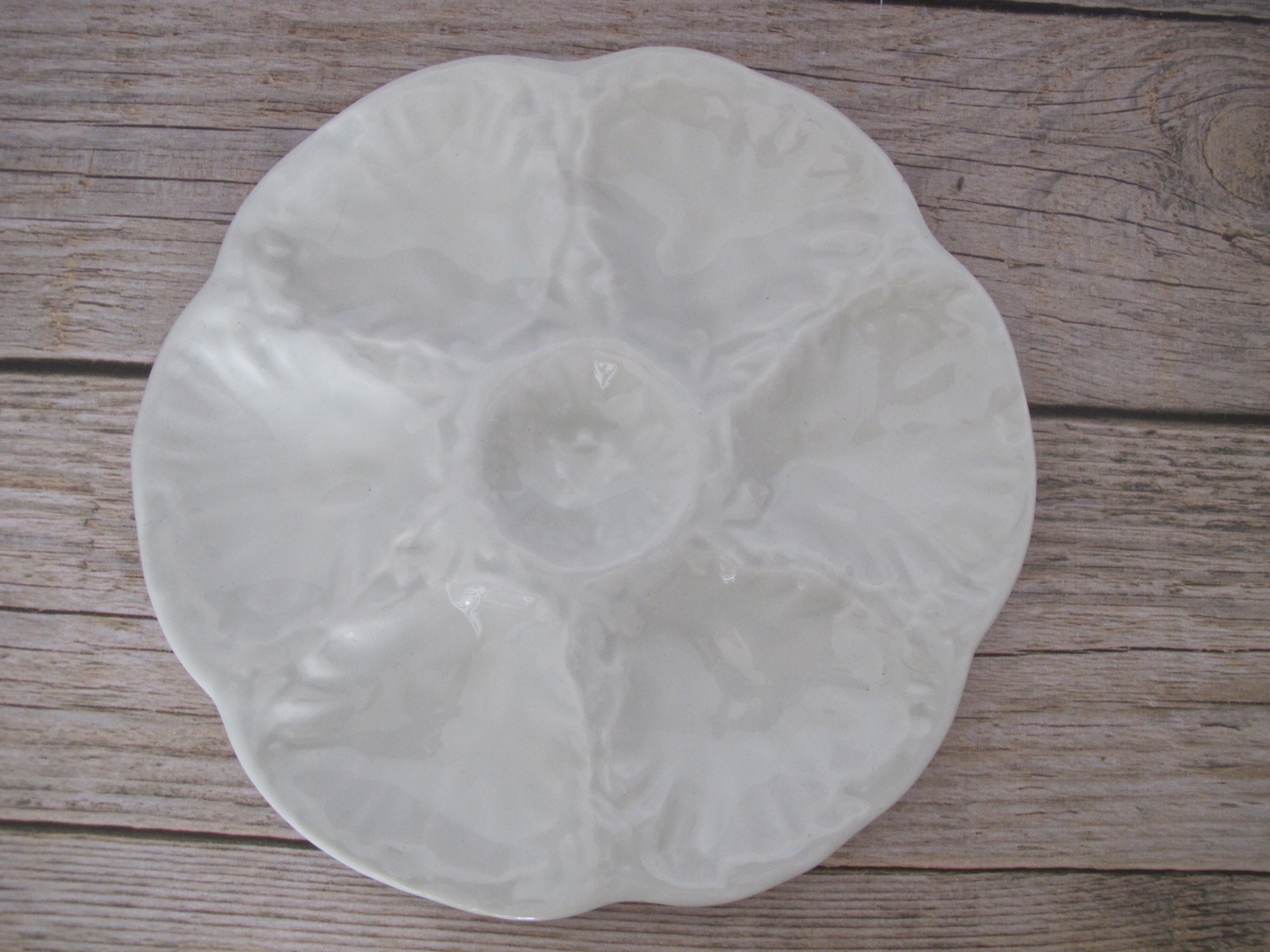 Assiette à huitres de Gien en faïence