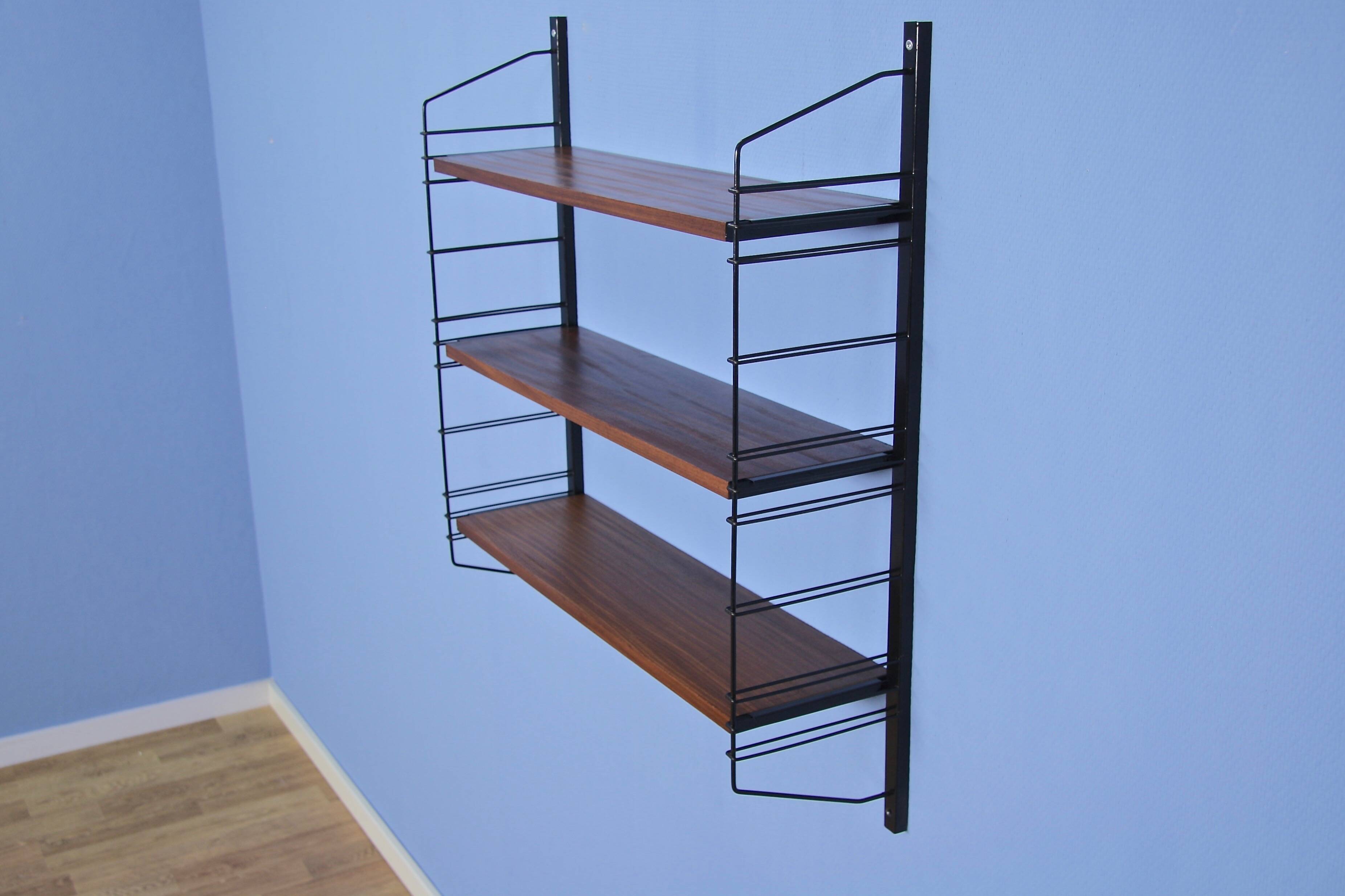 Dutch wall rack in teak and metal by A. Dekker for Tomado, 1960s