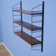 Dutch wall rack in teak and metal by A. Dekker for Tomado, 1960s