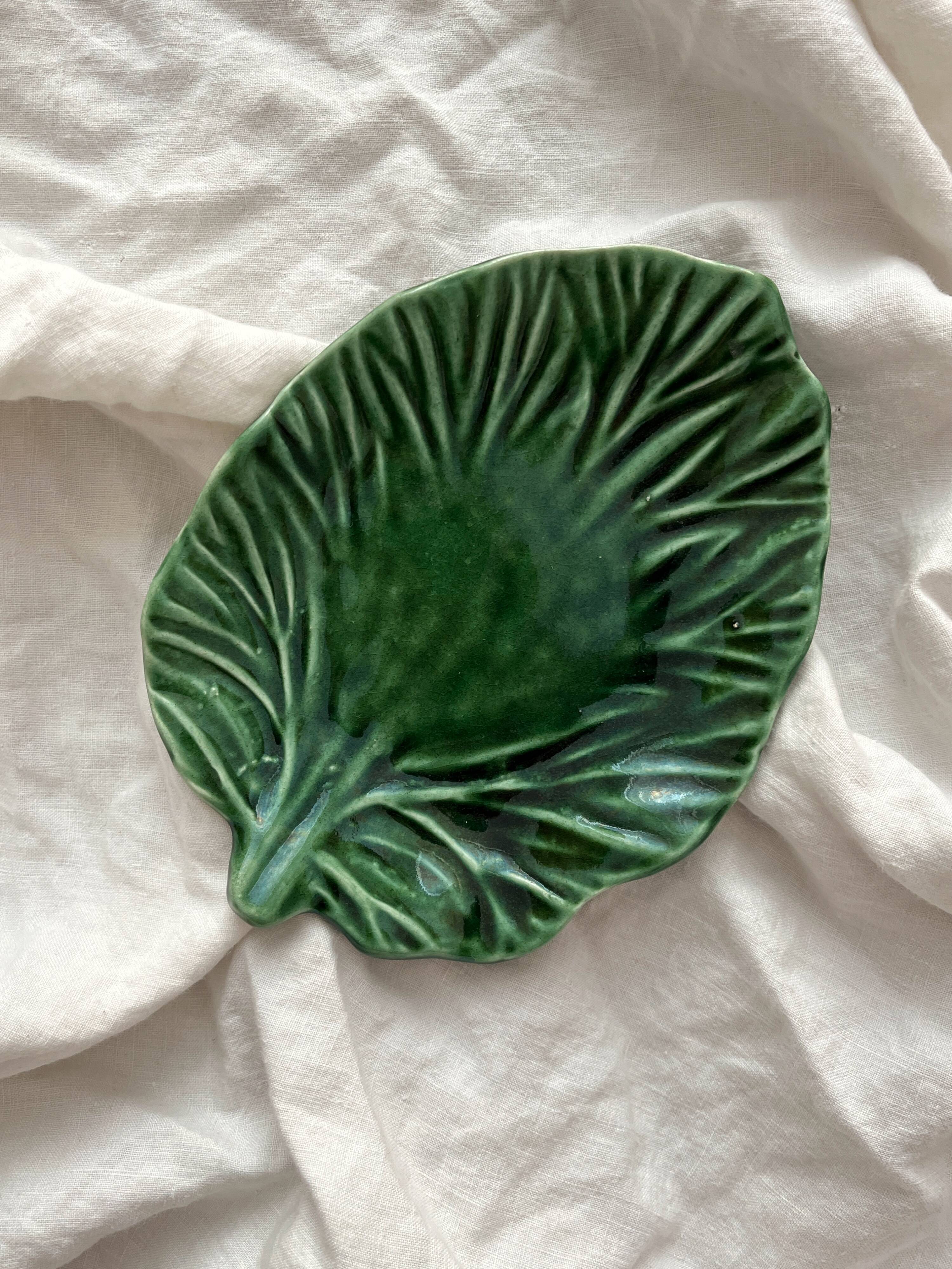 Small empty pocket dish in vintage slip leaf