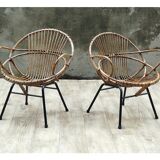 Pair of rattan shell chairs with metallic feet