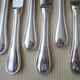 Box of 12 table knives in stainless steel and silver metal