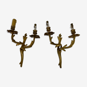 Pair of Louis XV wall lamps in gilded bronze