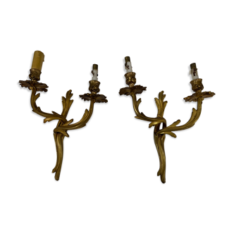 Pair of Louis XV wall lamps in gilded bronze