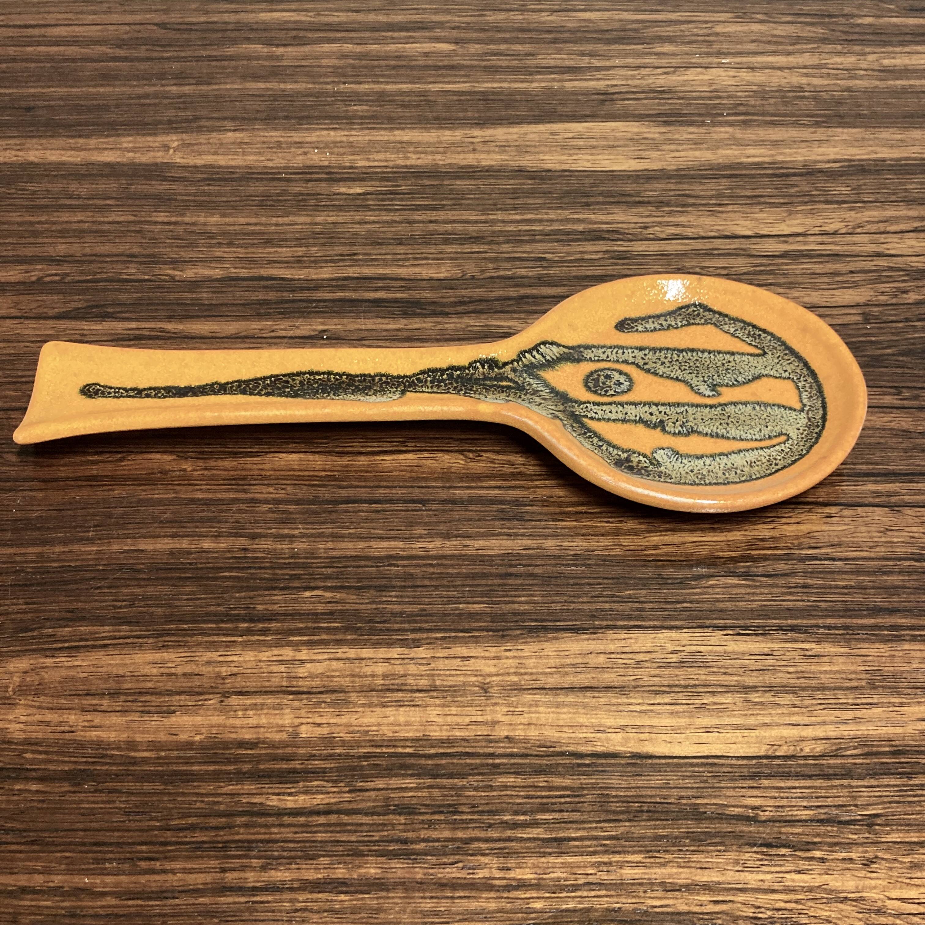 Pair of entirely handmade ceramic spoons.