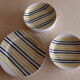 Set of 10 hollow plates and 1 striped dish mills of wolves