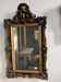 Miroir ancien biseauté du XIXe siècle, cadre sculpté et doré