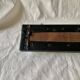 Vintage wall coat rack in wood and black Skai - 6 coat hooks