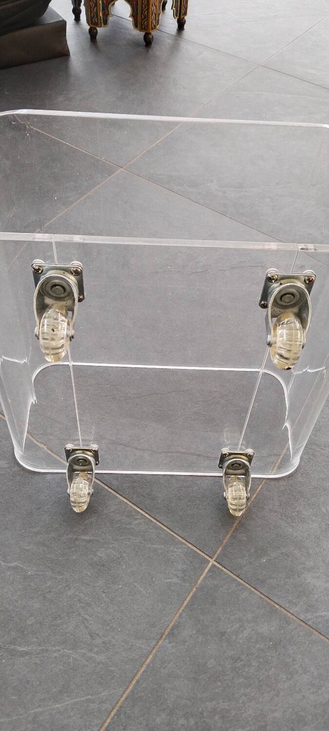 Plexiglas coffee table on wheels