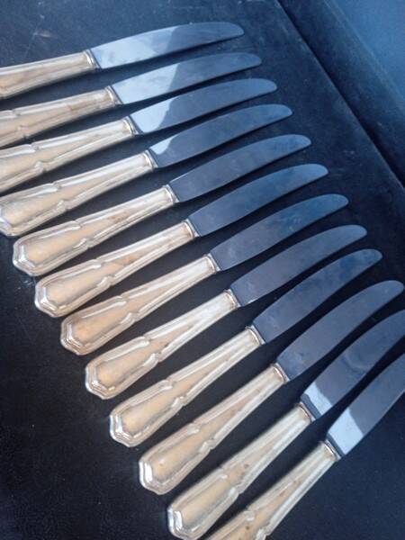12 knives + silver metal punch from the 1950s