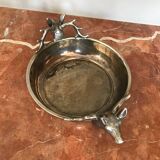 Empty silver metal pocket with deer heads