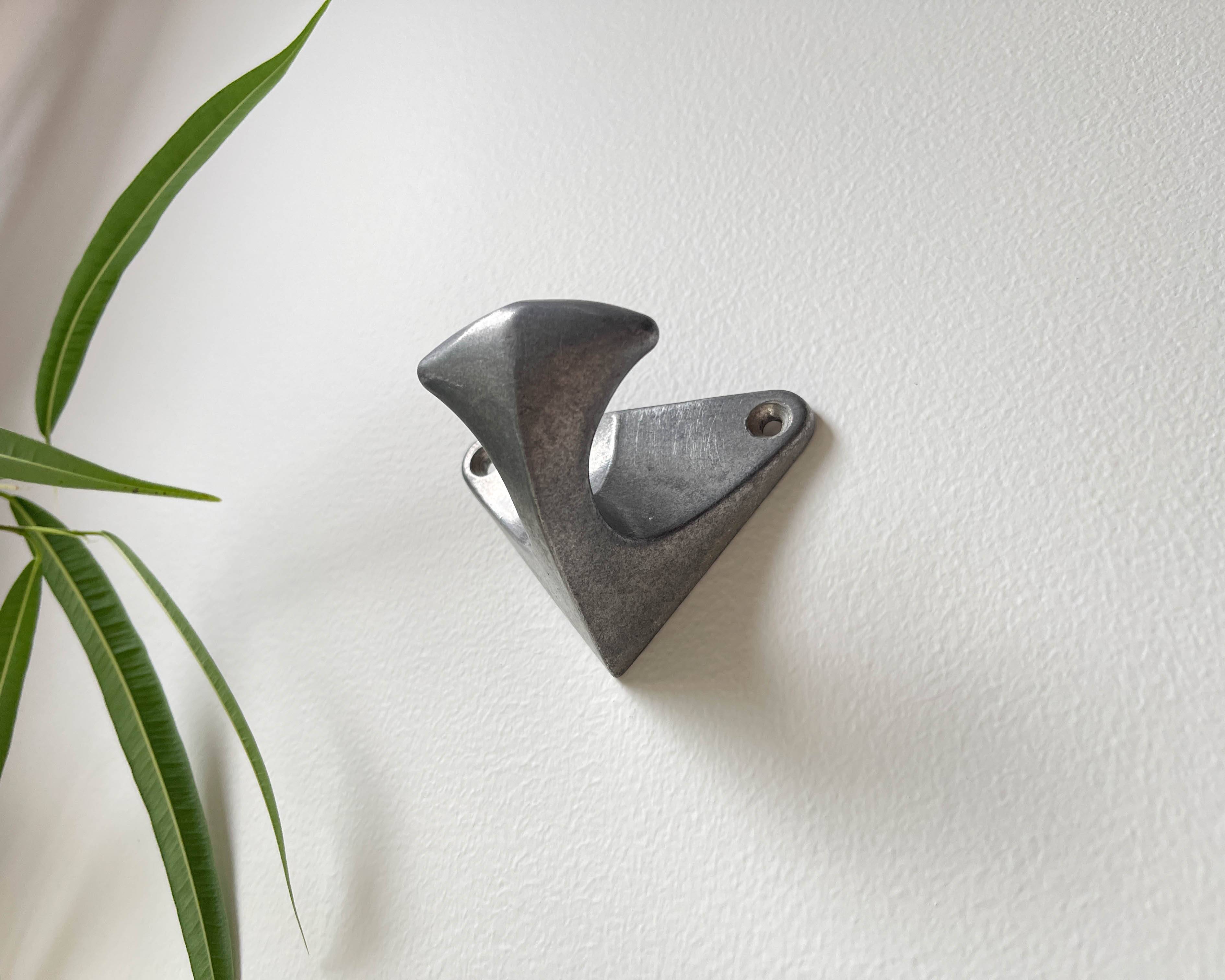 Vintage cast aluminum wall hooks