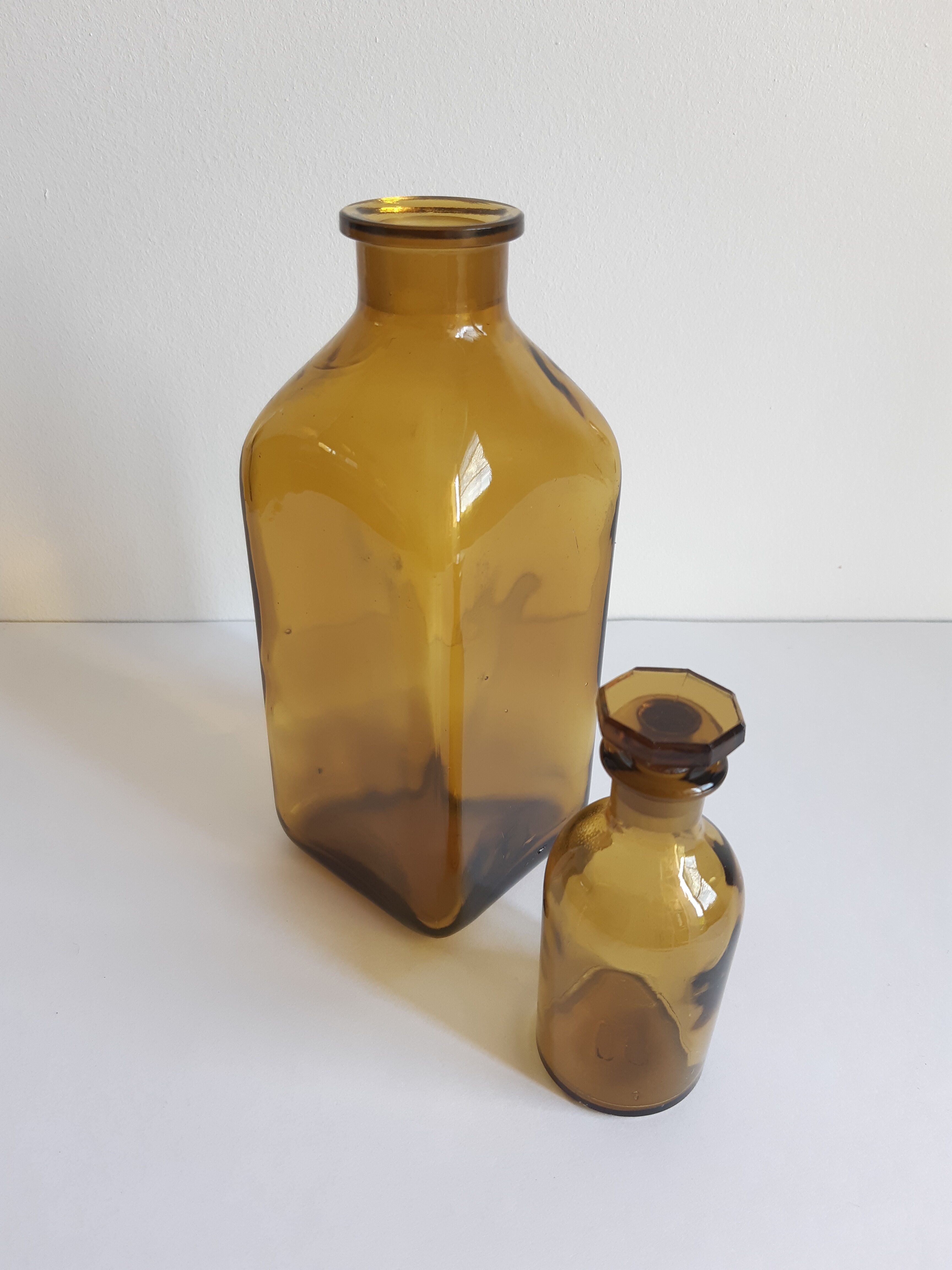 Set of 2 vintage glass bottles
