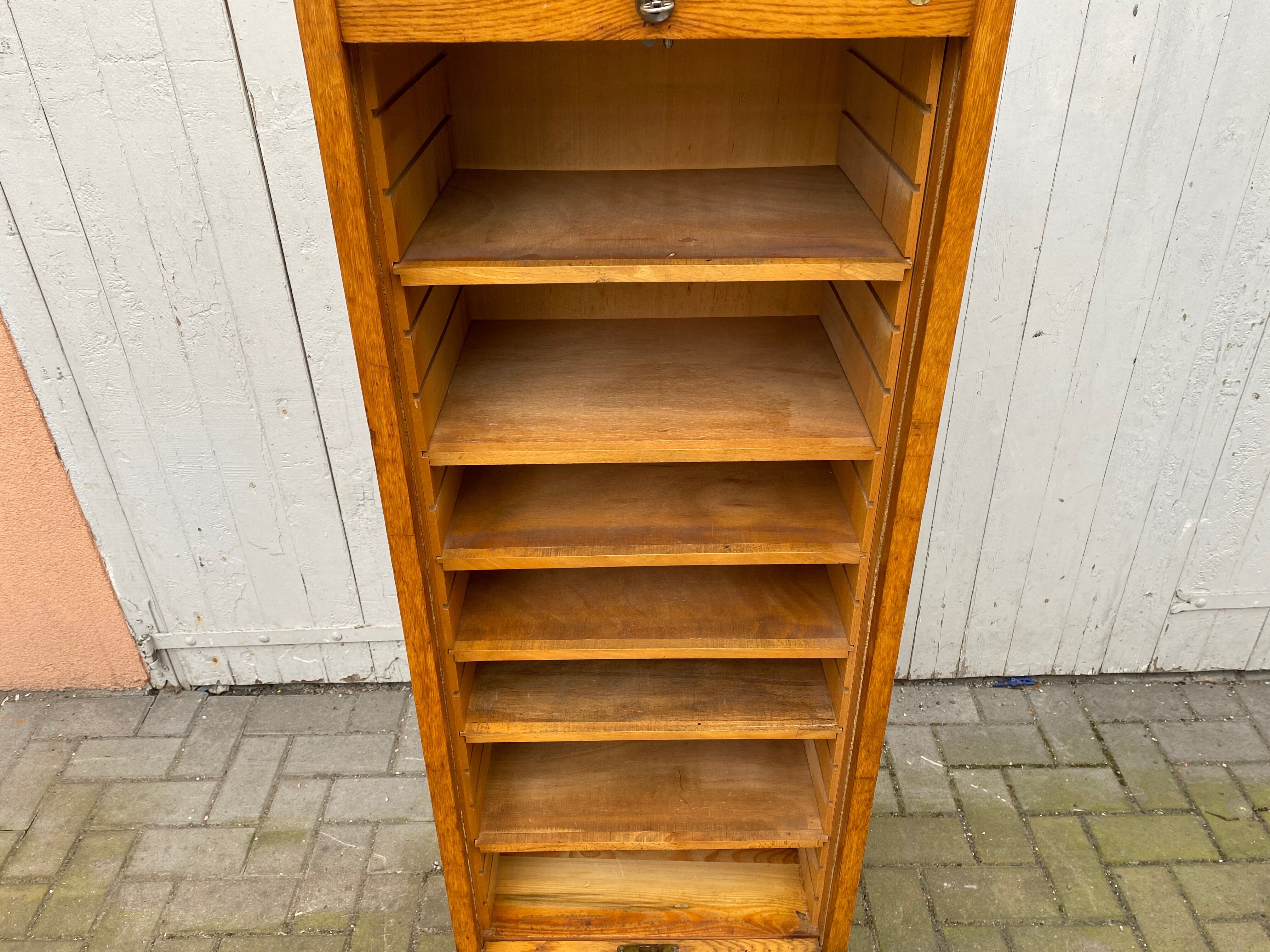Industrial furniture notary binder with vintage j-b curtain 1960s