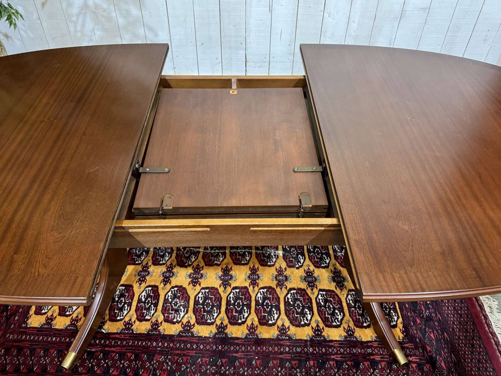 Oval GPlan table in mahogany from the 1970s with a butterfly extension.