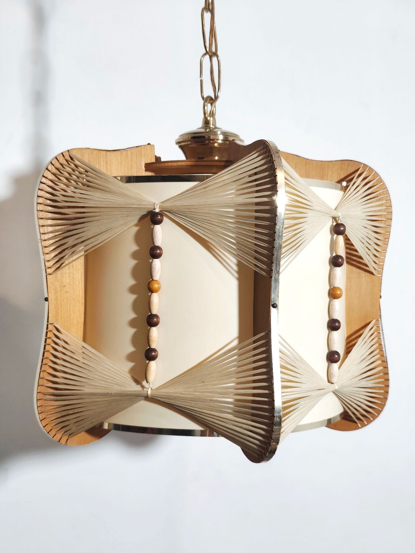 Raffia and wood ceiling lamp. Spain, 1970s.