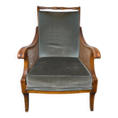 Regency style bergère armchair in wood, fabric and cane