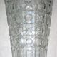 Transparent glass vase with art deco geometric patterns