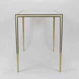 A pair of brass and white mirror tables from Vereinigte Werkstätten, Germany, 1970s.