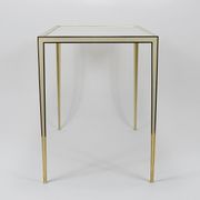 A pair of brass and white mirror tables from Vereinigte Werkstätten, Germany, 1970s.