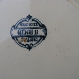 Flat plate in faience iron earth Henri II