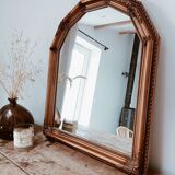Golden mirror with moldings