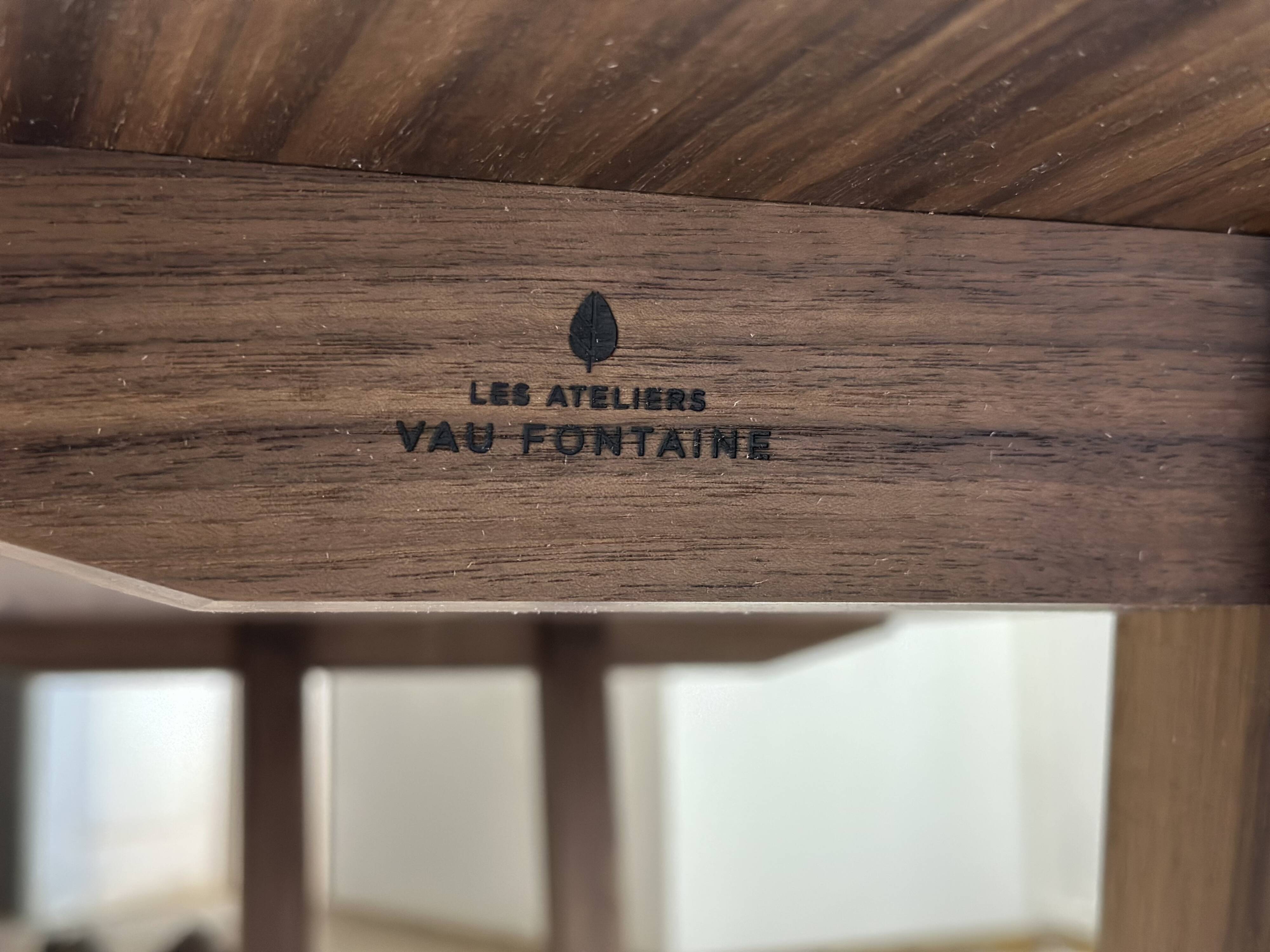 Exceptional dining table in solid walnut.