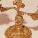 Old candle holder in gilded bronze