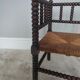 Turned wooden corner chair