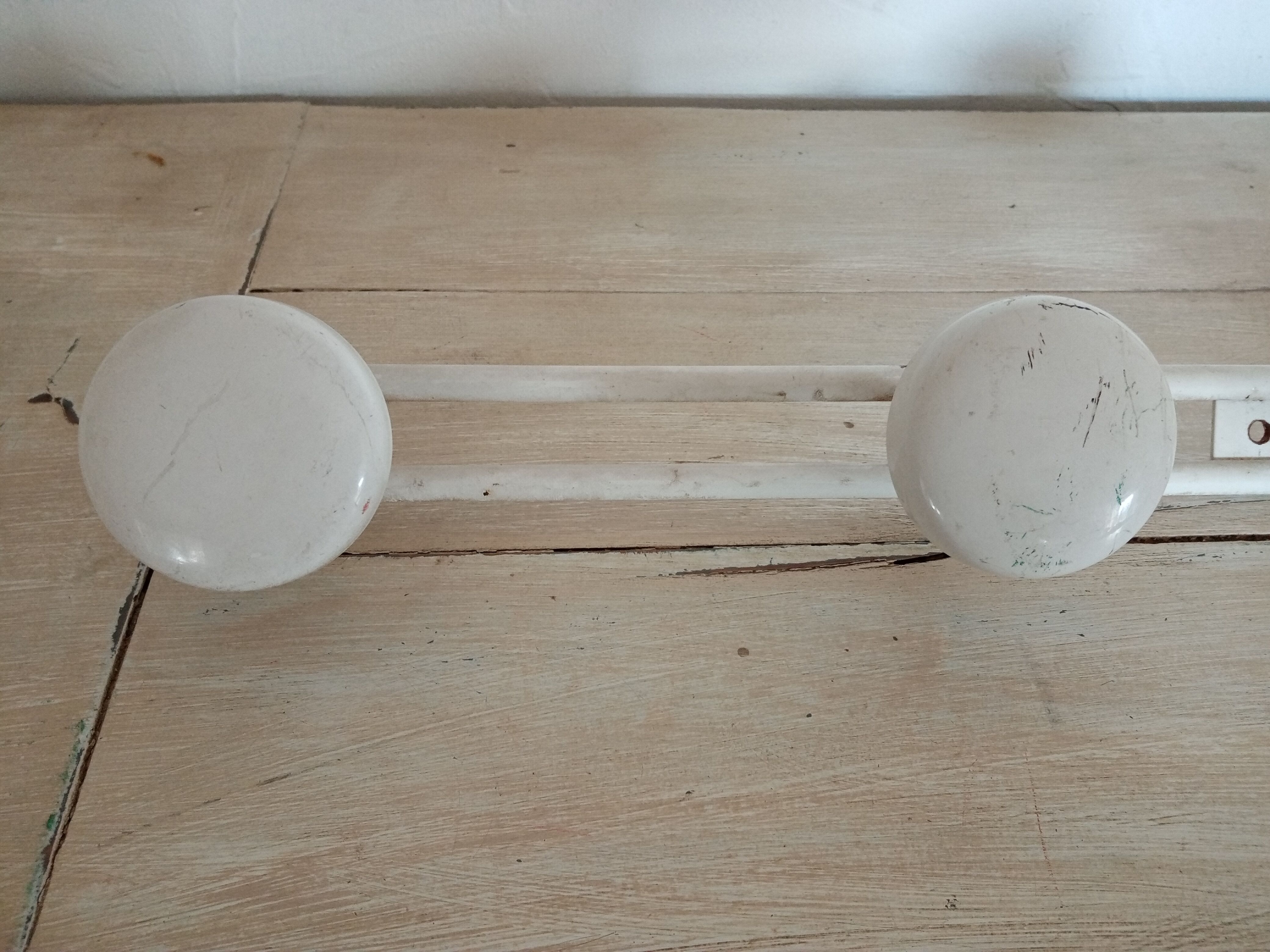 Metal wall coat holder