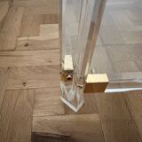 2 side tables in plexiglass, glass, and brass.
