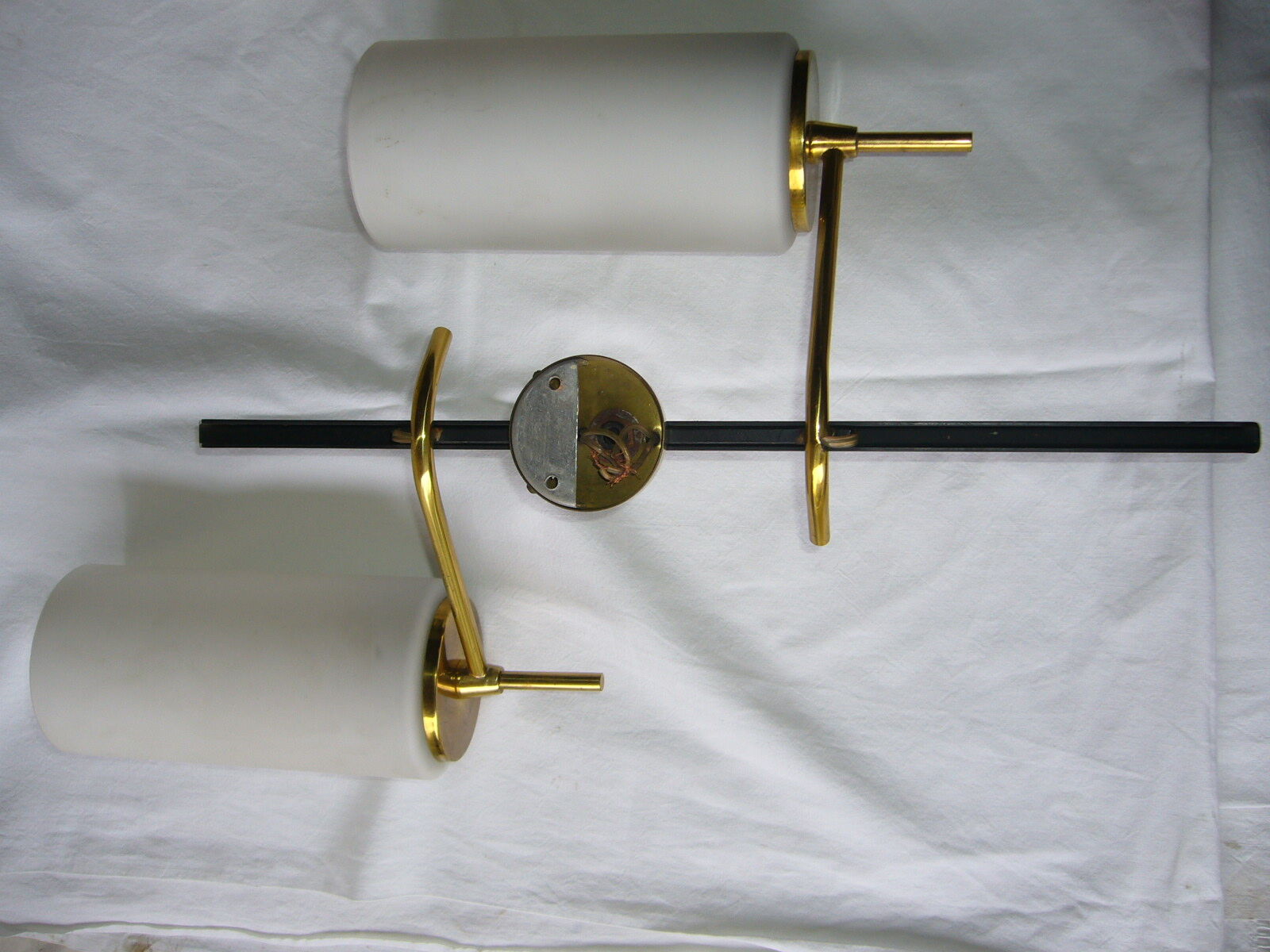 Black and gold metal sconces, Arlus house opalin lenses from the 1950s